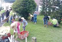 Children also participate in cleaning activities around the factory